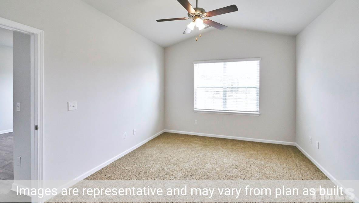 608 Rex Court Carthage, NC 28327 - Photo 18 of 22 an empty room with a window and ceiling fan