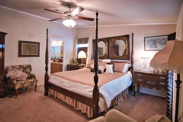 a view of a lake view with houses in back