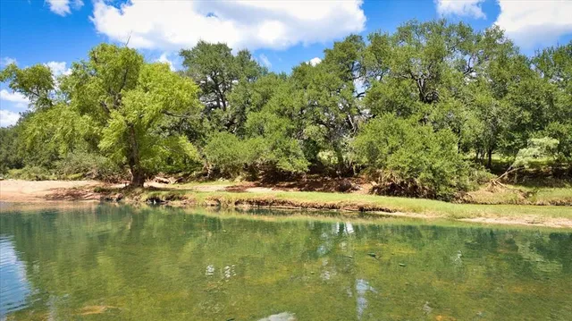 an aerial view of a house with a garden