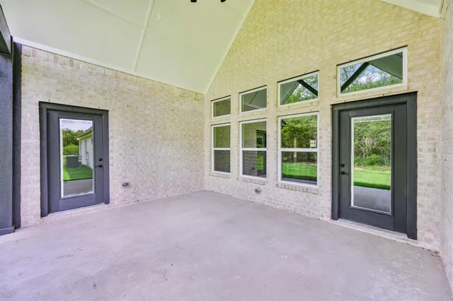 a view of an empty room with a balcony