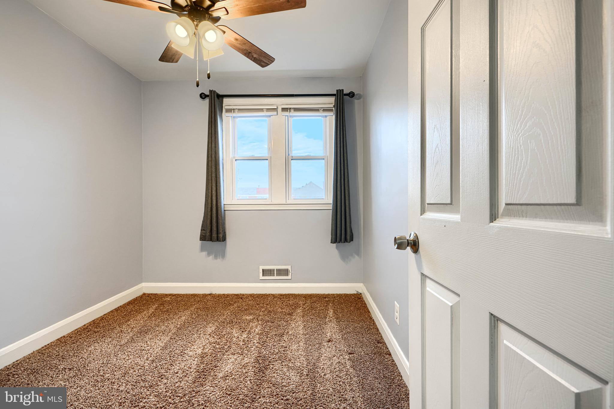 7807 Rockbourne Road Dundalk, MD 21222 - Photo 18 of 31 a view of an empty room with a window