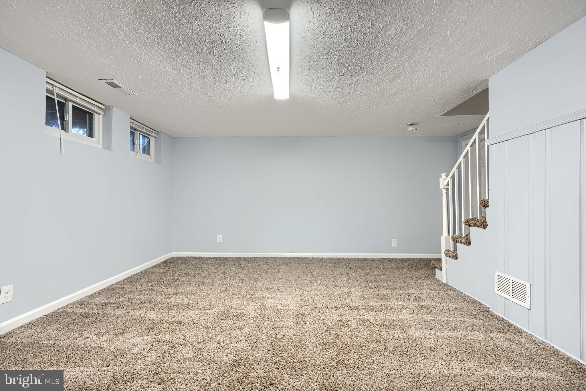 7807 Rockbourne Road Dundalk, MD 21222 - Photo 29 of 31 a view of an empty room with a window