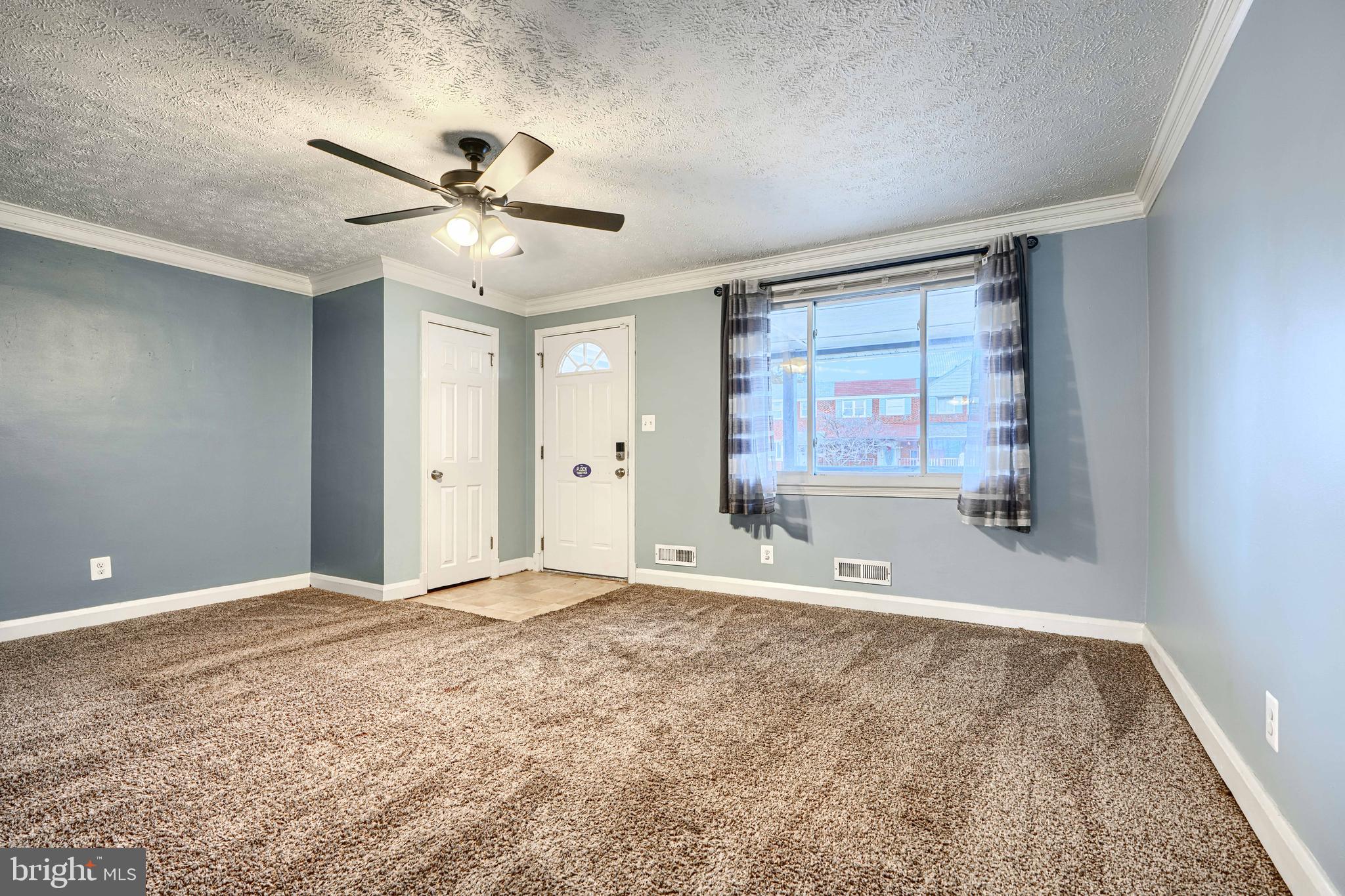 7807 Rockbourne Road Dundalk, MD 21222 - Photo 7 of 31 a view of an empty room with a window