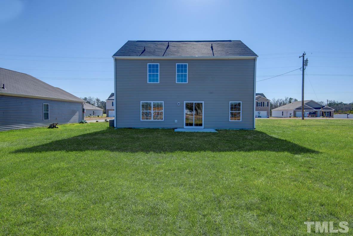 7621 Sand Pit Road Stantonsburg, NC 27883 - Photo 5 of 58 a front view of house with yard and green space