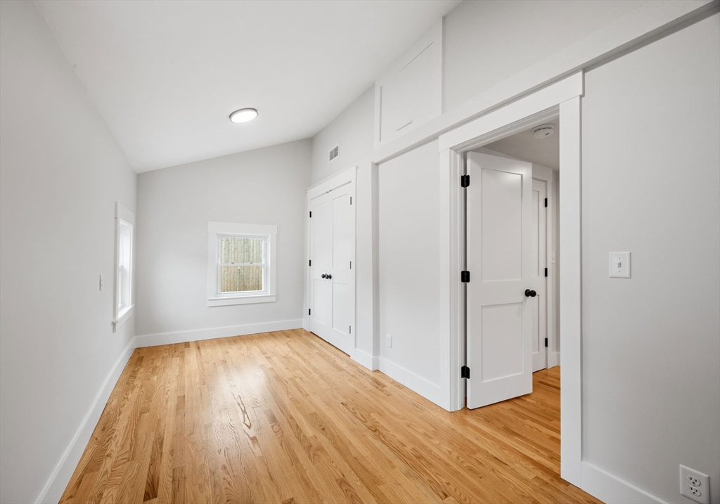 18 Martin Street Wareham, MA 02532 - Photo 30 of 42 a view of a hallway with wooden floor and closet area