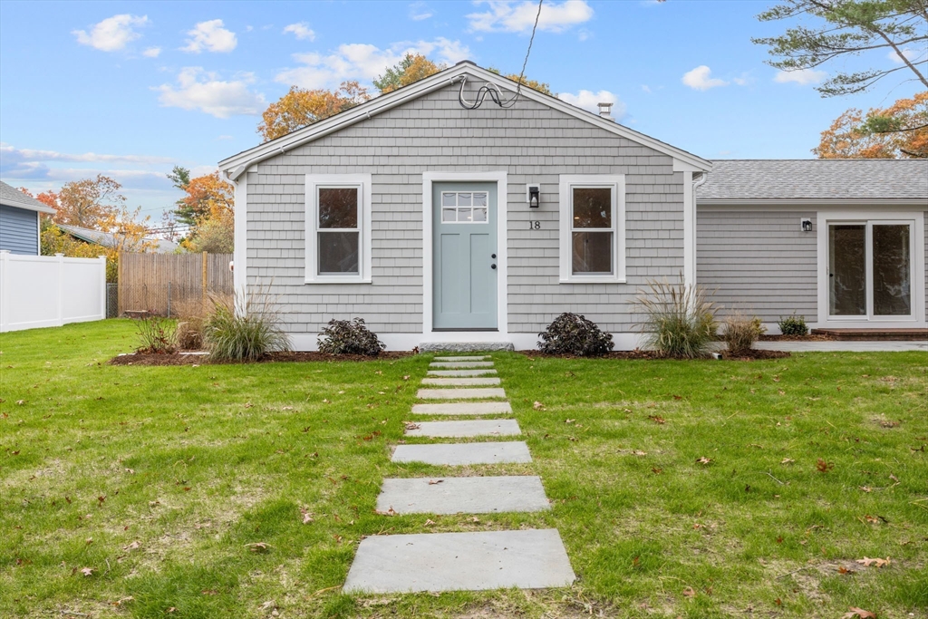 18 Martin Street Wareham, MA 02532 - Photo 3 of 42 a front view of a house with a garden
