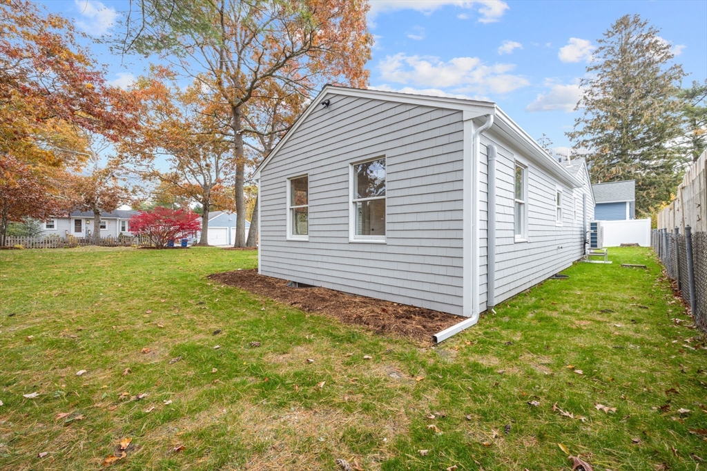 18 Martin Street Wareham, MA 02532 - Photo 8 of 42 a view of a backyard with a garden