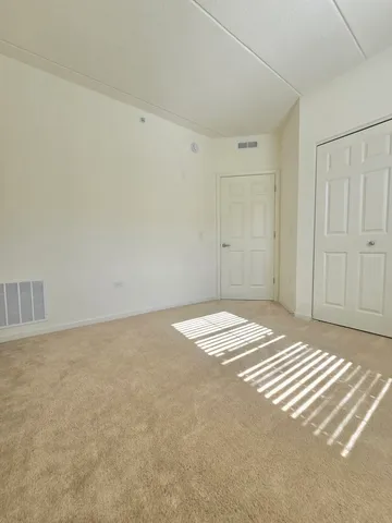 a view of a livingroom with a bathroom