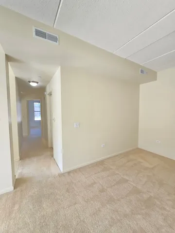 an empty room with a bathroom