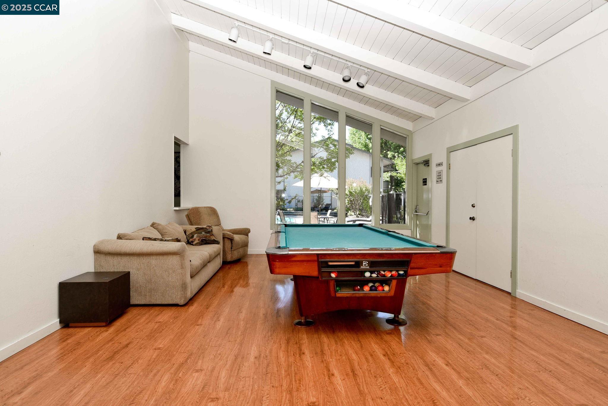 1411 Marchbanks Drive, Unit 2 Walnut Creek, CA 94598 - Photo 29 of 42 a room with furniture pool table and windows