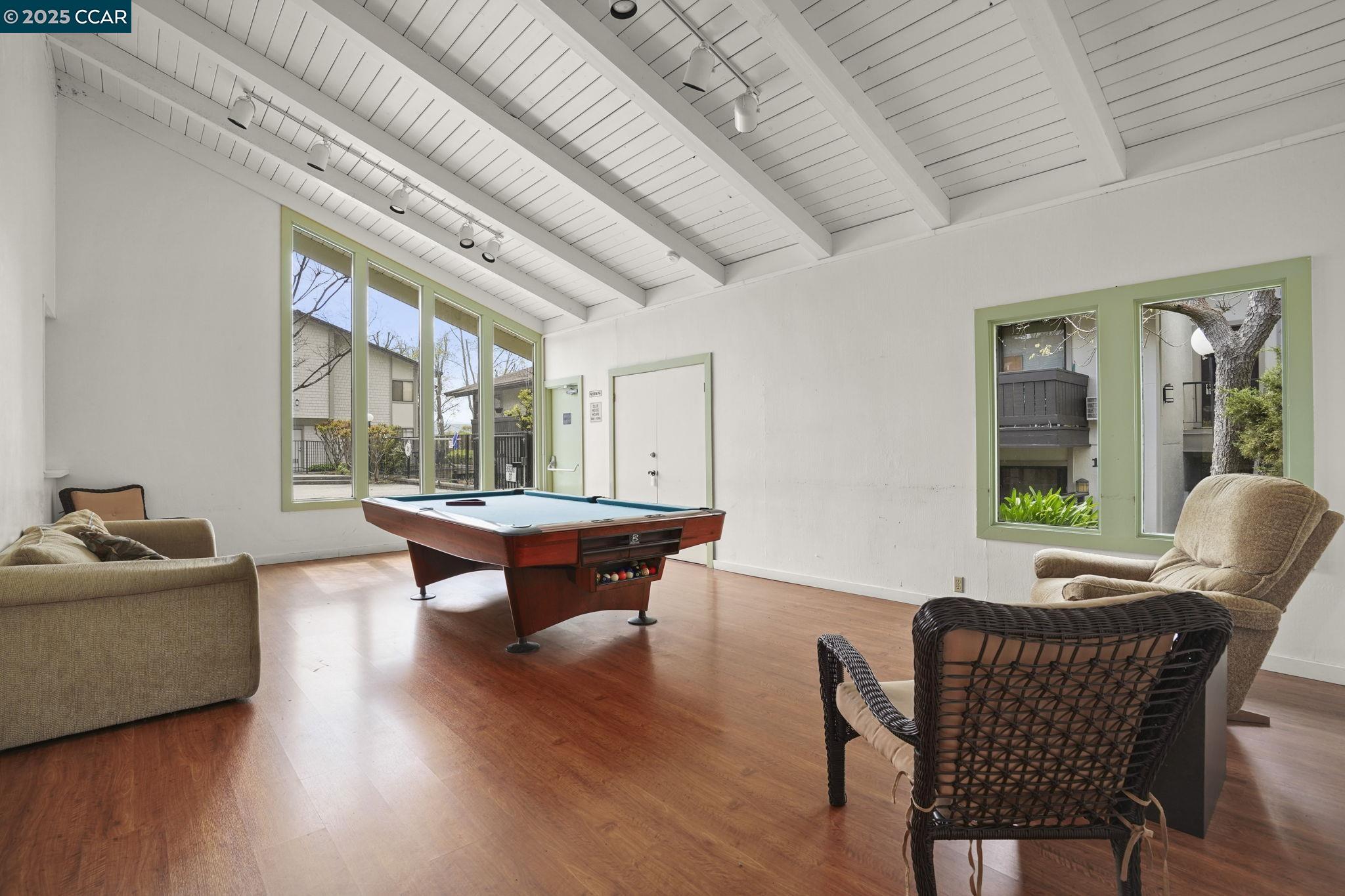 1411 Marchbanks Drive, Unit 2 Walnut Creek, CA 94598 - Photo 30 of 42 a living room with furniture and a large window