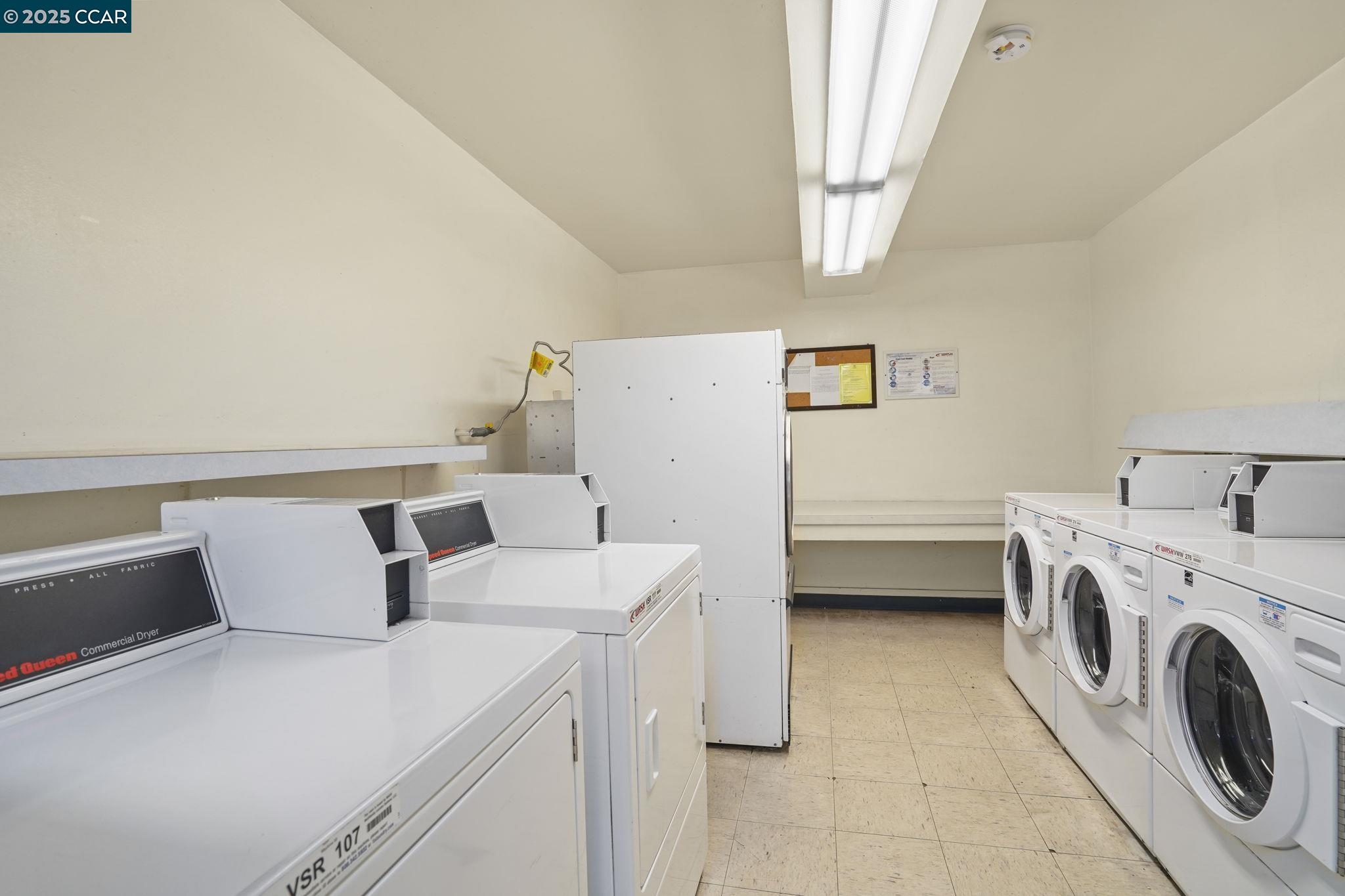 1411 Marchbanks Drive, Unit 2 Walnut Creek, CA 94598 - Photo 32 of 42 a utility room with dryer and washer