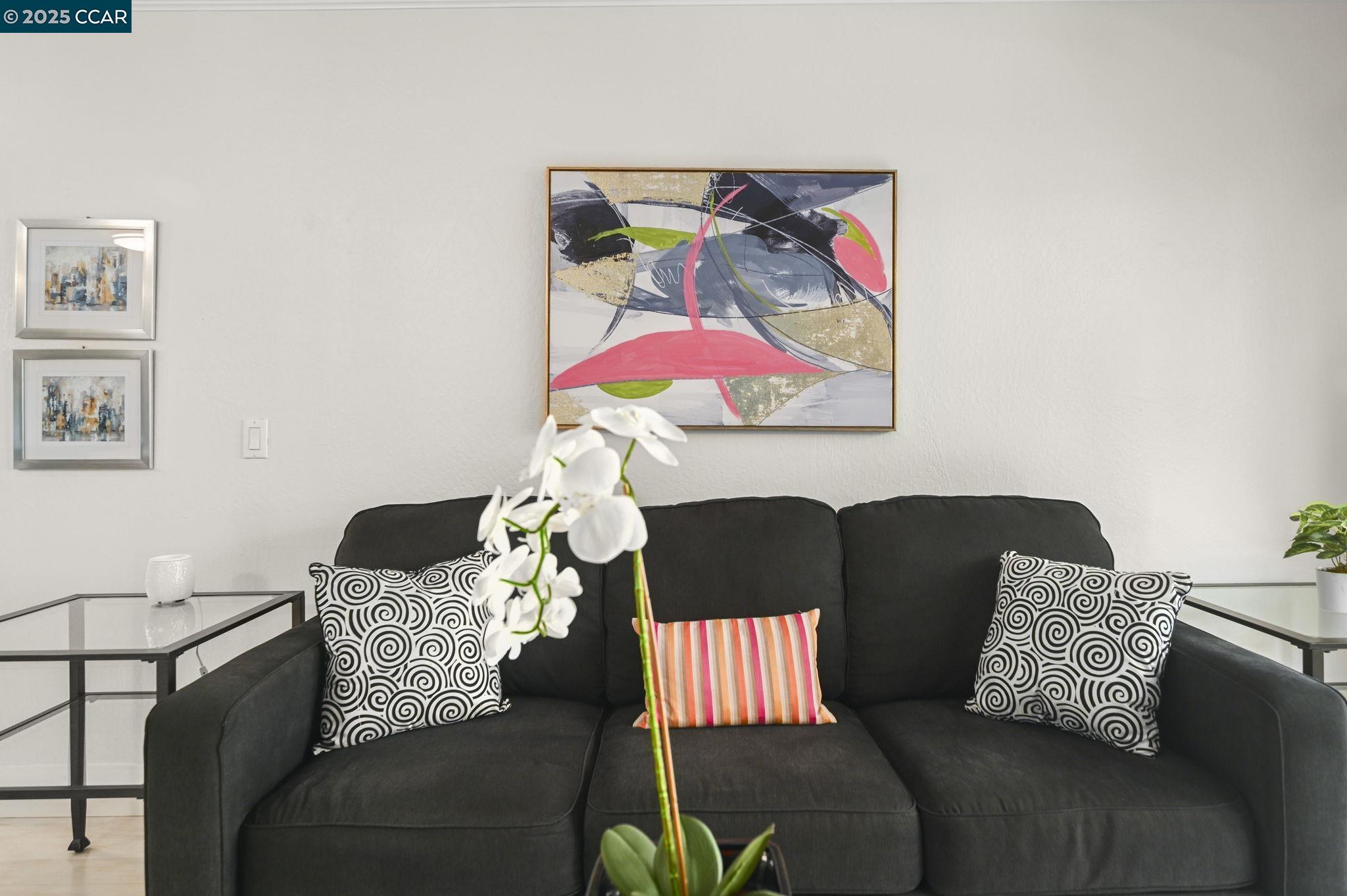 1411 Marchbanks Drive, Unit 2 Walnut Creek, CA 94598 - Photo 7 of 42 a living room with furniture and painting on the wall