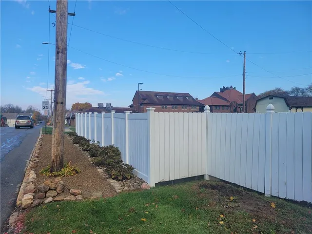 a view of a pathway with a yard