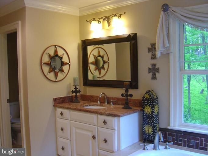 16820 Whites Store Road Boyds, MD 20841 - Photo 26 of 30 a bathroom with a granite countertop double vanity sink mirror and window
