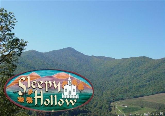 Lot #17 Legend Road, Unit 17 Waynesville, NC 28786 - Photo 1 of 1 a sign that is on a pole