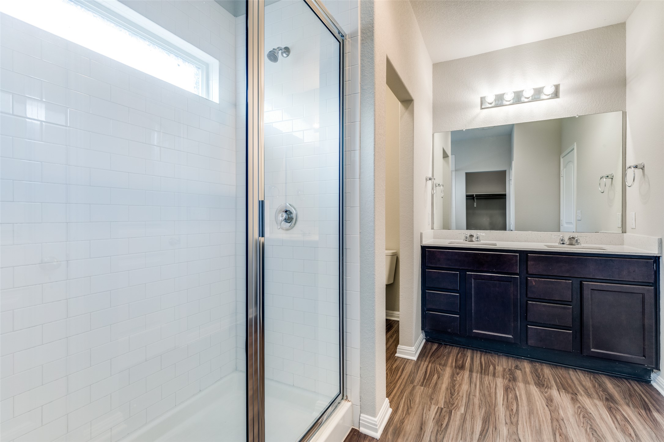 348 Shiner Lane Georgetown, TX 78626 - Photo 17 of 37 a bathroom with a sink and a mirror