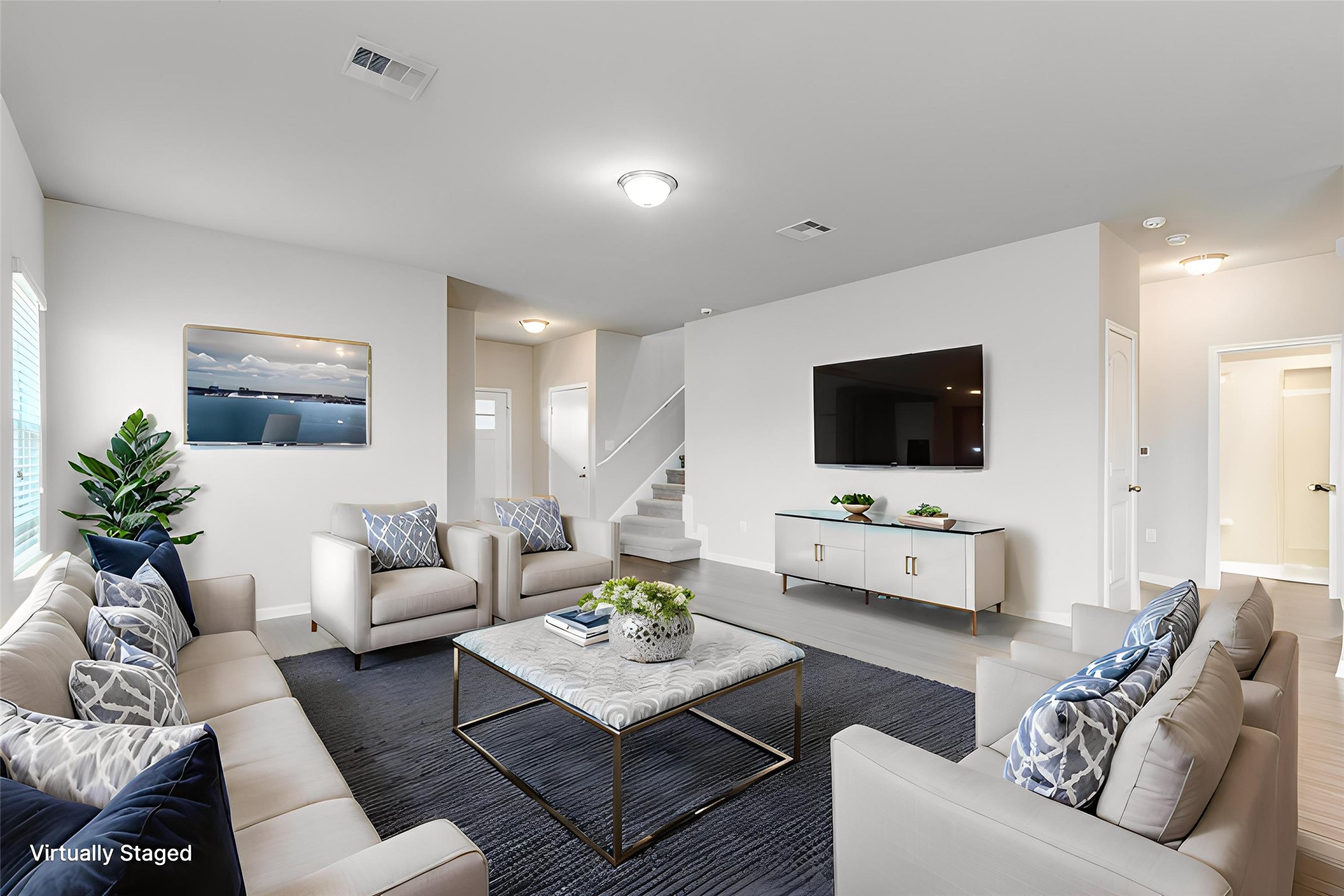348 Shiner Lane Georgetown, TX 78626 - Photo 23 of 37 a living room with furniture and a flat screen tv