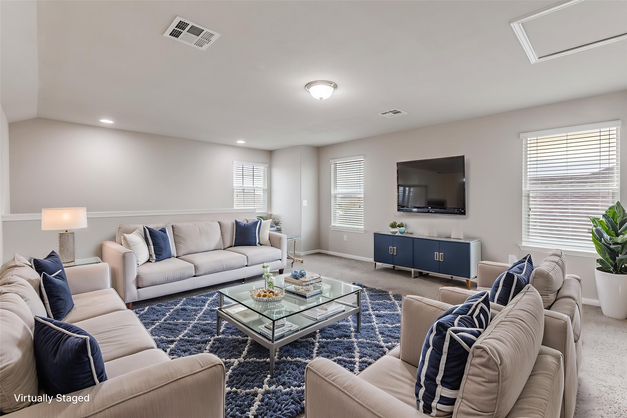 348 Shiner Lane Georgetown, TX 78626 - Photo 25 of 37 a living room with furniture and a flat screen tv