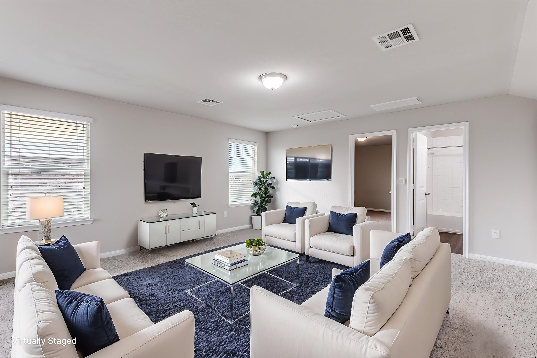 348 Shiner Lane Georgetown, TX 78626 - Photo 27 of 37 a living room with furniture or couch and a flat screen tv