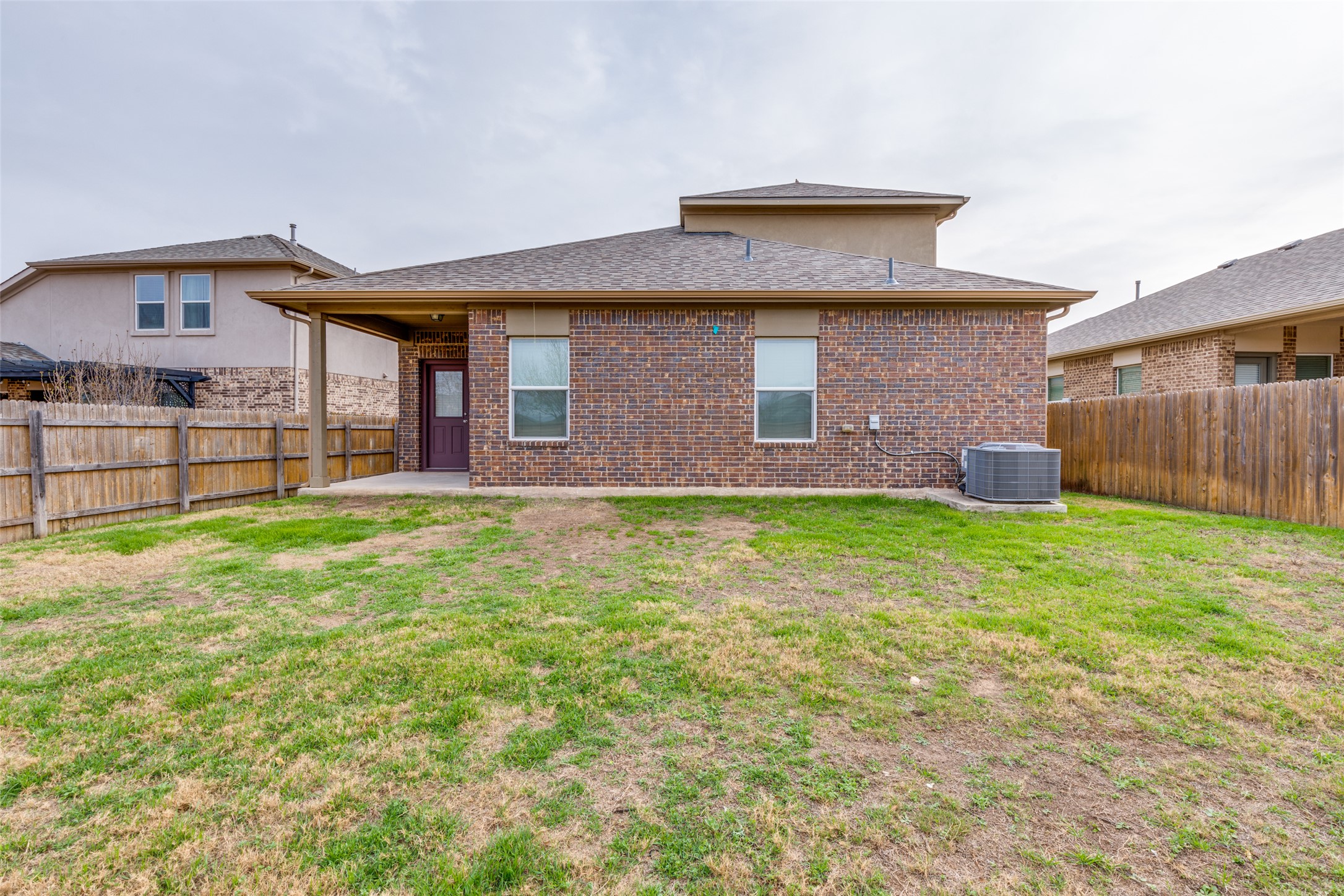348 Shiner Lane Georgetown, TX 78626 - Photo 35 of 37 a front view of a house with a yard and garage