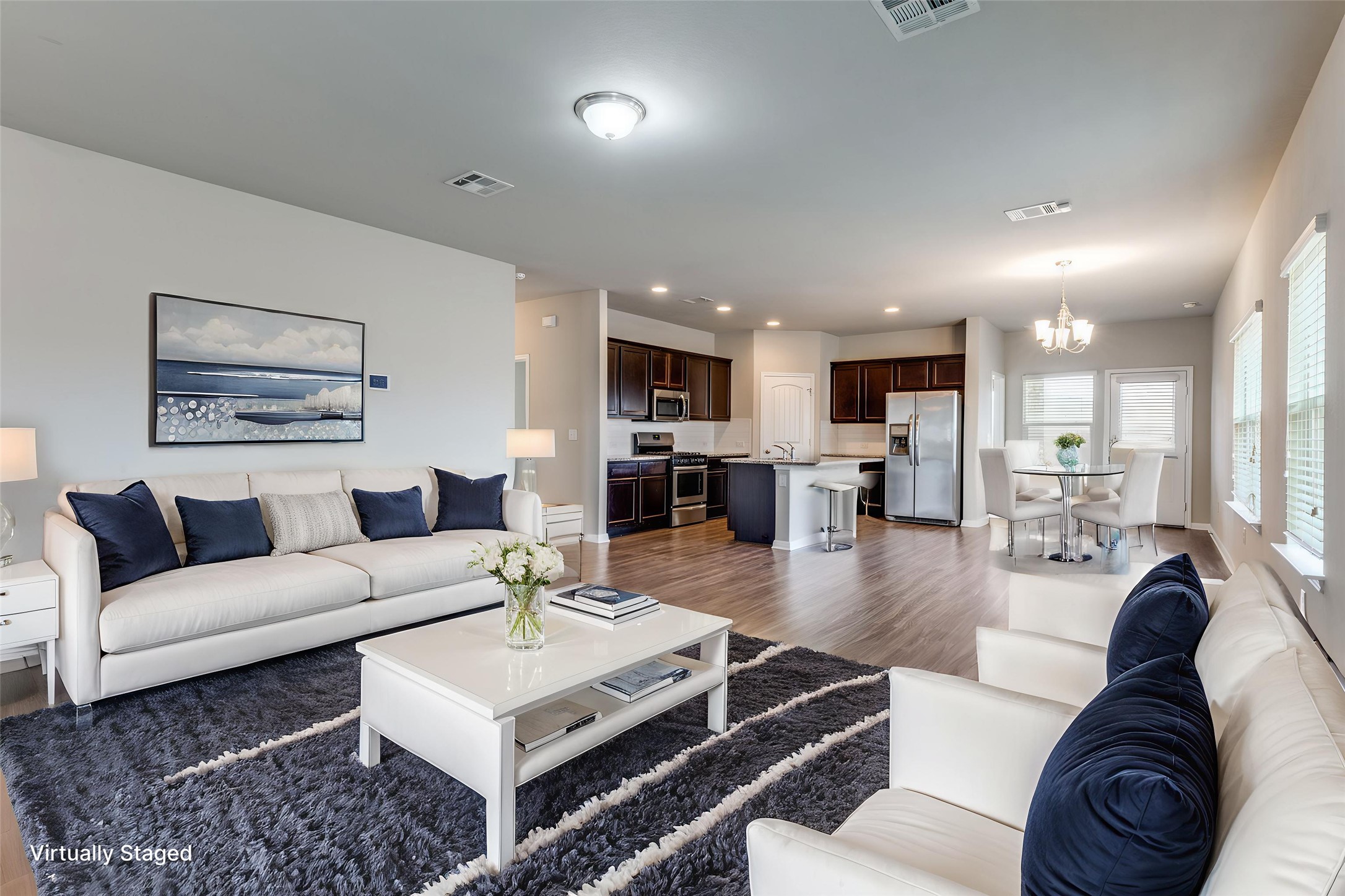 348 Shiner Lane Georgetown, TX 78626 - Photo 4 of 37 a living room with furniture and wooden floor