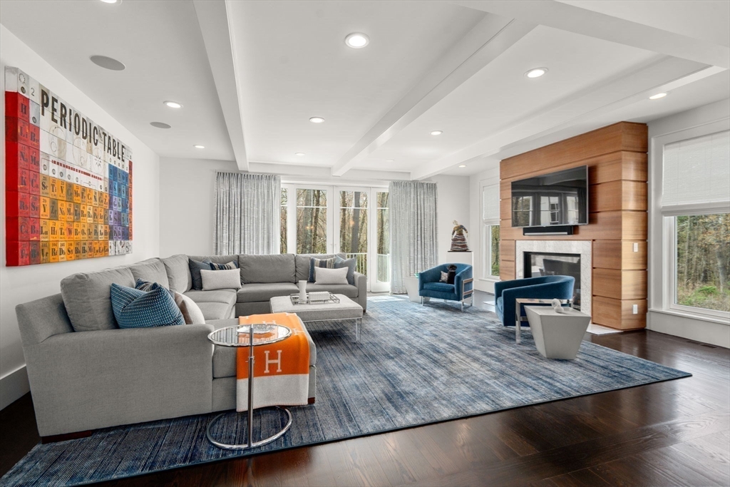 72 Love Lane Weston, MA 02493 - Photo 16 of 41 a living room with furniture and a fireplace