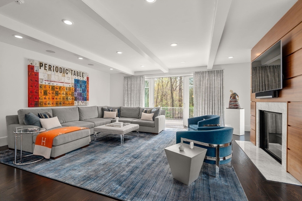 72 Love Lane Weston, MA 02493 - Photo 17 of 41 a living room with furniture and a fireplace