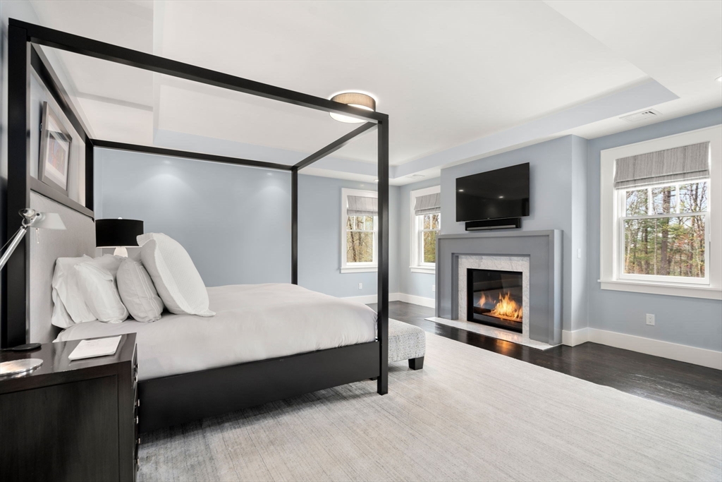 72 Love Lane Weston, MA 02493 - Photo 22 of 41 a living room with furniture and a fireplace