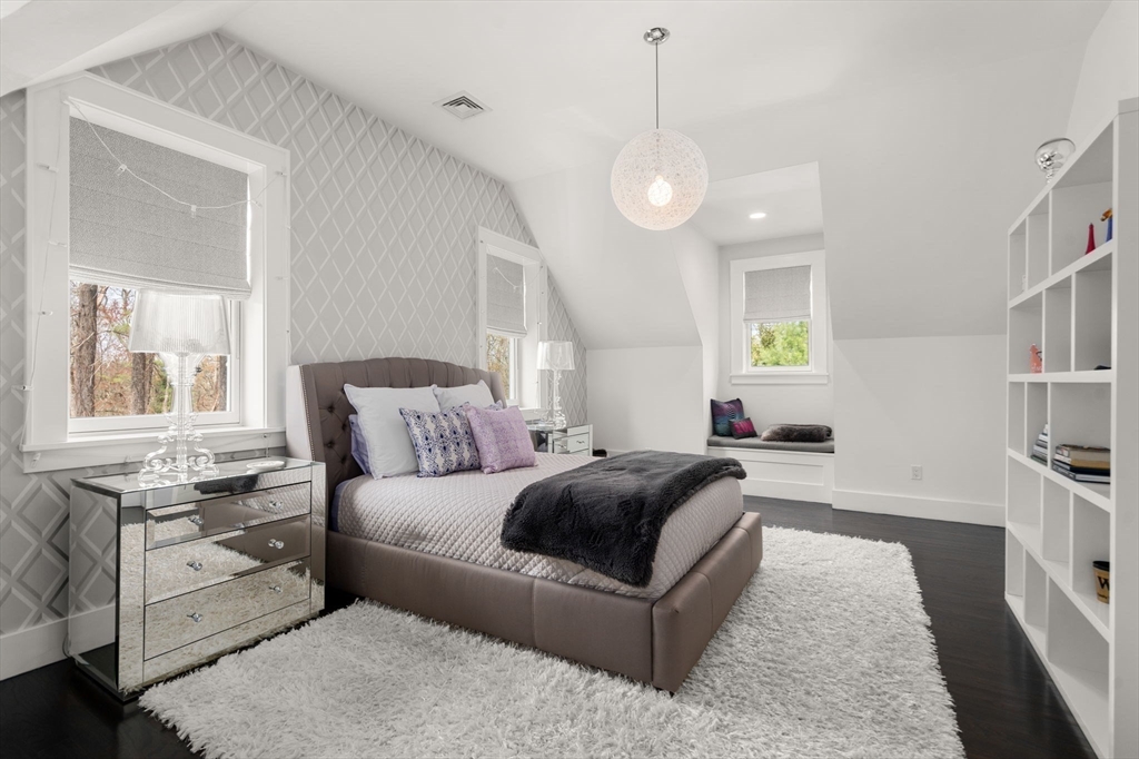 72 Love Lane Weston, MA 02493 - Photo 30 of 41 a spacious bedroom with a large bed and a window