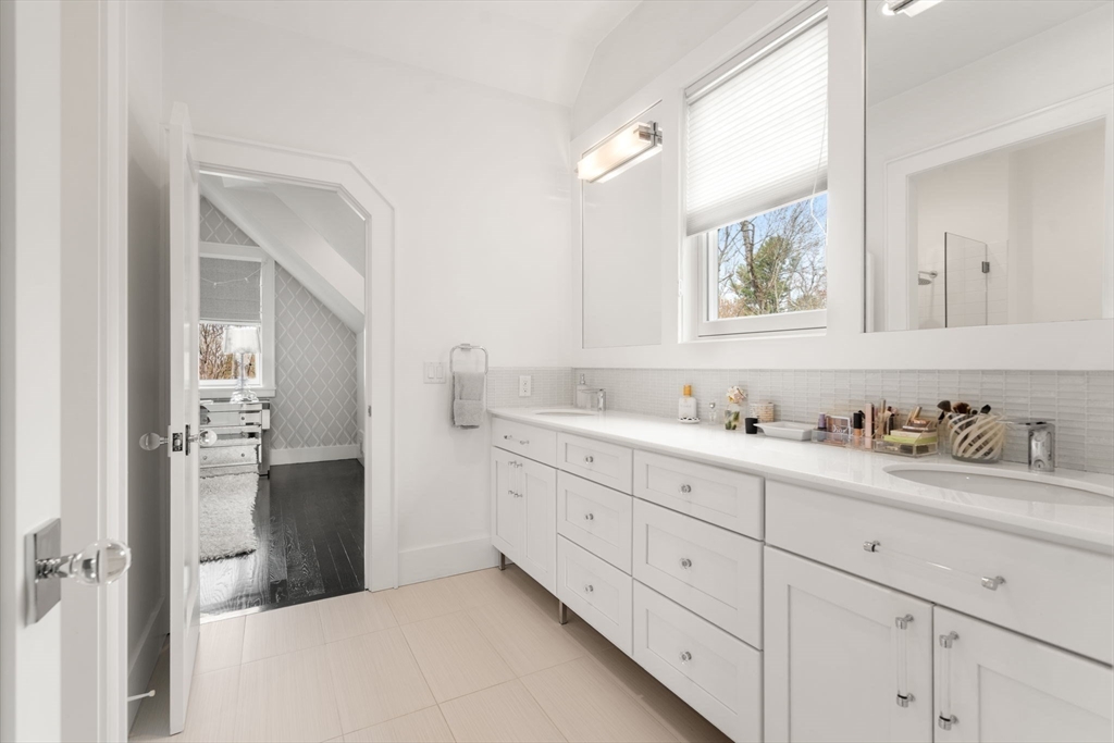 72 Love Lane Weston, MA 02493 - Photo 31 of 41 a bathroom with a granite countertop sink and a mirror