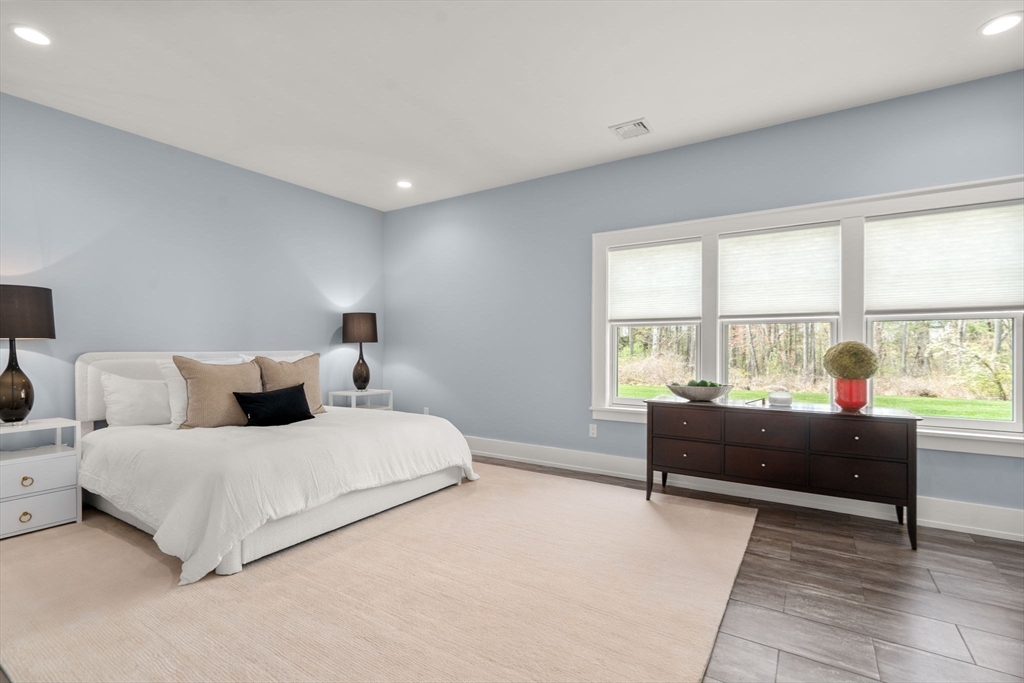 72 Love Lane Weston, MA 02493 - Photo 34 of 41 a bedroom with a bed and a large window