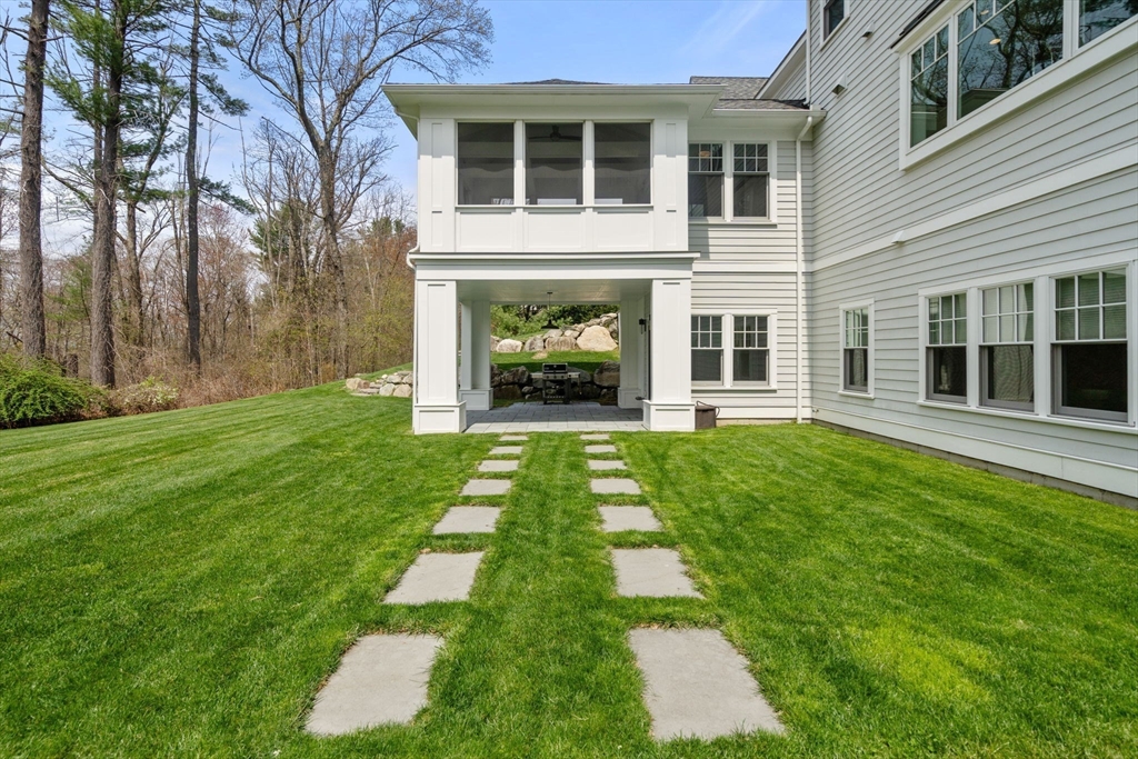 72 Love Lane Weston, MA 02493 - Photo 37 of 41 a front view of a house with garden