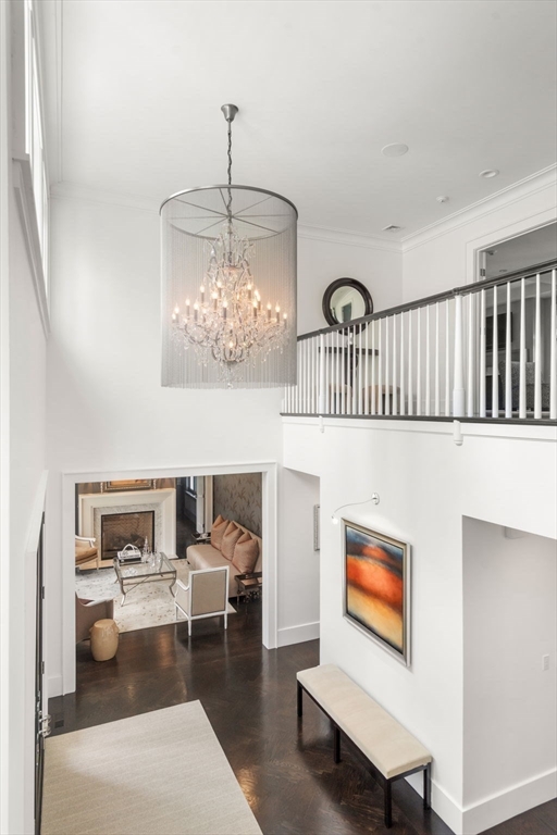 72 Love Lane Weston, MA 02493 - Photo 4 of 41 a living room with furniture and a chandelier