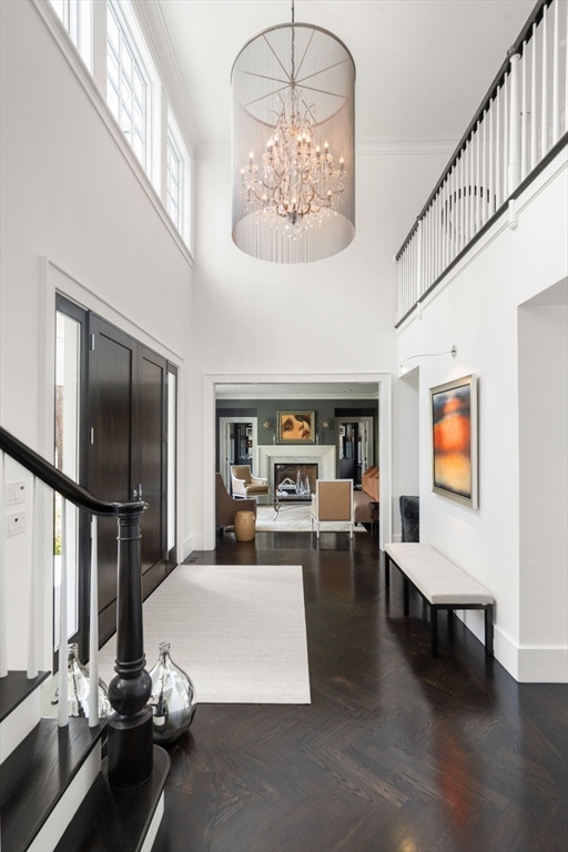 72 Love Lane Weston, MA 02493 - Photo 5 of 41 a living room with furniture and a flat screen tv