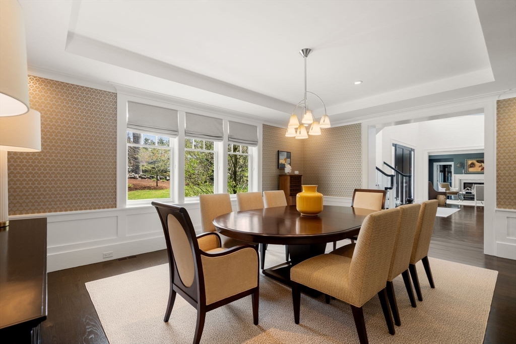 72 Love Lane Weston, MA 02493 - Photo 8 of 41 a dining room with furniture a chandelier and window