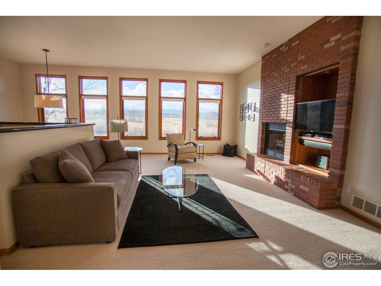6201 Compton Road Fort Collins, CO 80525 - Photo 3 of 23 Living Room with Gas Fireplace