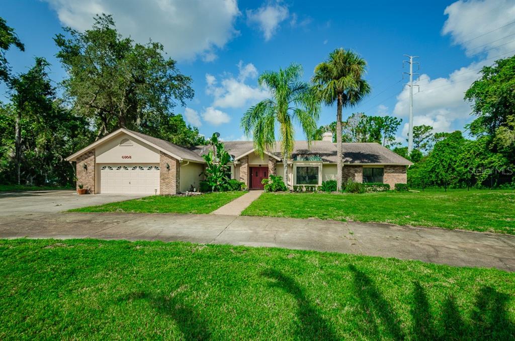 6808 Ridge Top Drive New Port Richey, FL 34655 - Photo 1 of 1 Front of Home with Circular Drive