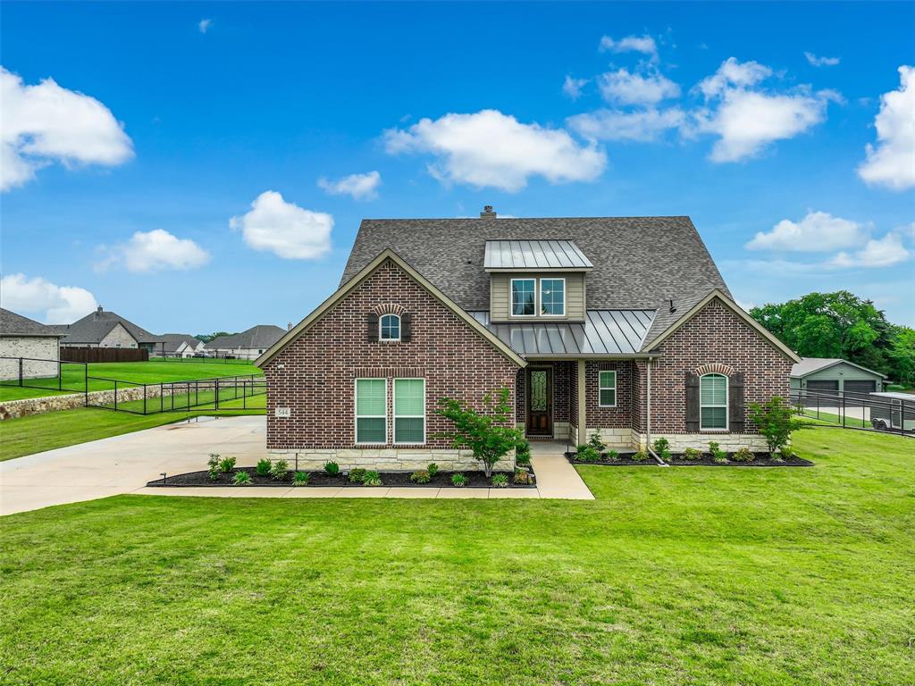 544 Majors Road Van Alstyne, TX 75495 - Photo 32 of 36 a front view of house with yard and green space