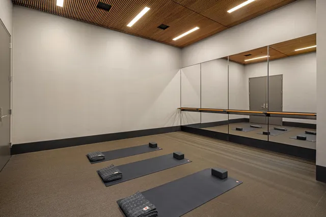 an empty room with wooden floor