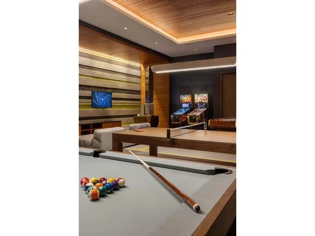 a view of living room with furniture and a flat screen tv