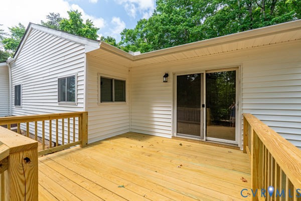 865 Sulphur Spring Road Prospect, VA 23960 - Photo 7 of 40 Spacious outdoor deck with natural wood railing, w