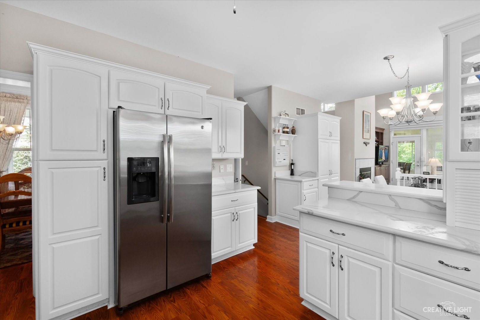 708 Viewpointe Drive St. Charles, IL 60174 - Photo 12 of 38 a kitchen with stainless steel appliances a refrigerator sink and cabinets