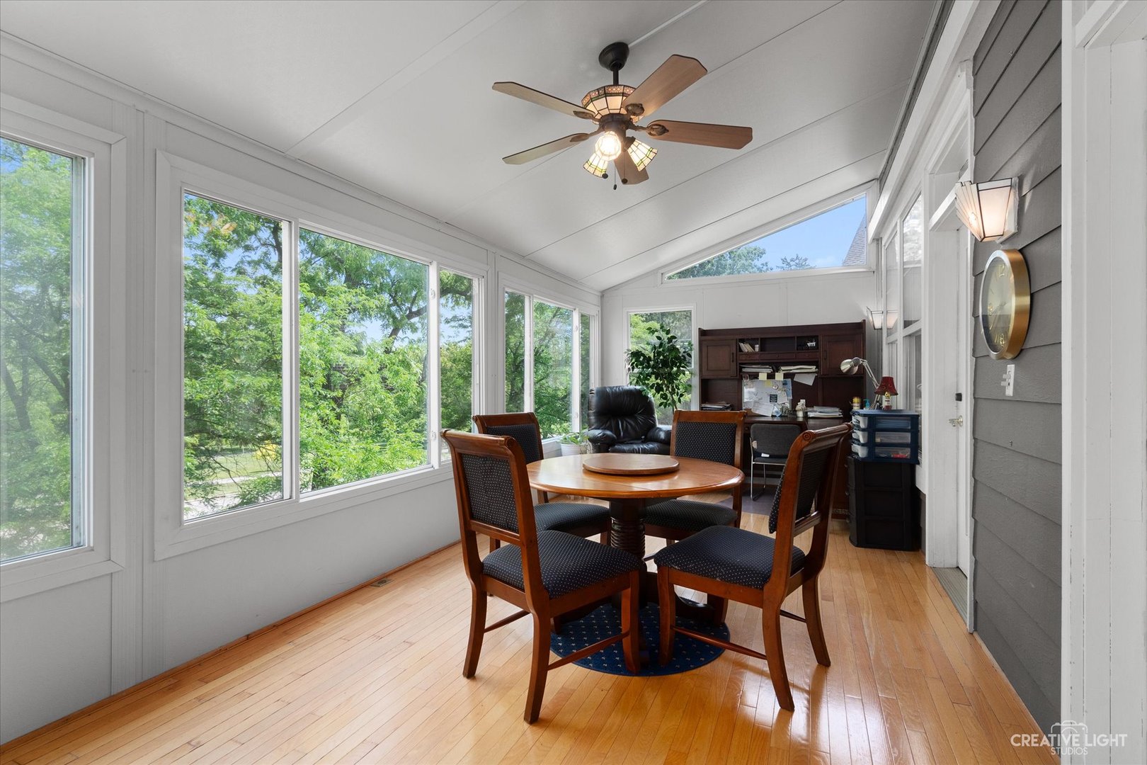 708 Viewpointe Drive St. Charles, IL 60174 - Photo 15 of 38 a view of a dining room with furniture window and wooden floor