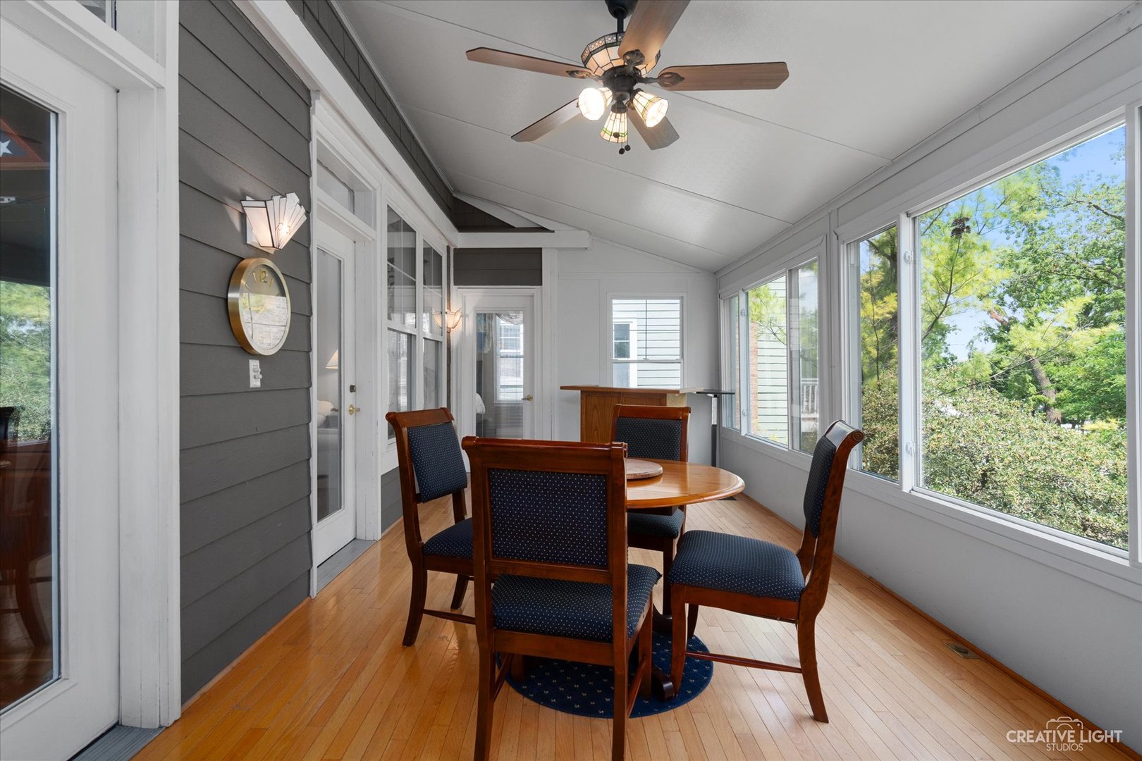 708 Viewpointe Drive St. Charles, IL 60174 - Photo 16 of 38 a dining room with furniture a chandelier and wooden floor