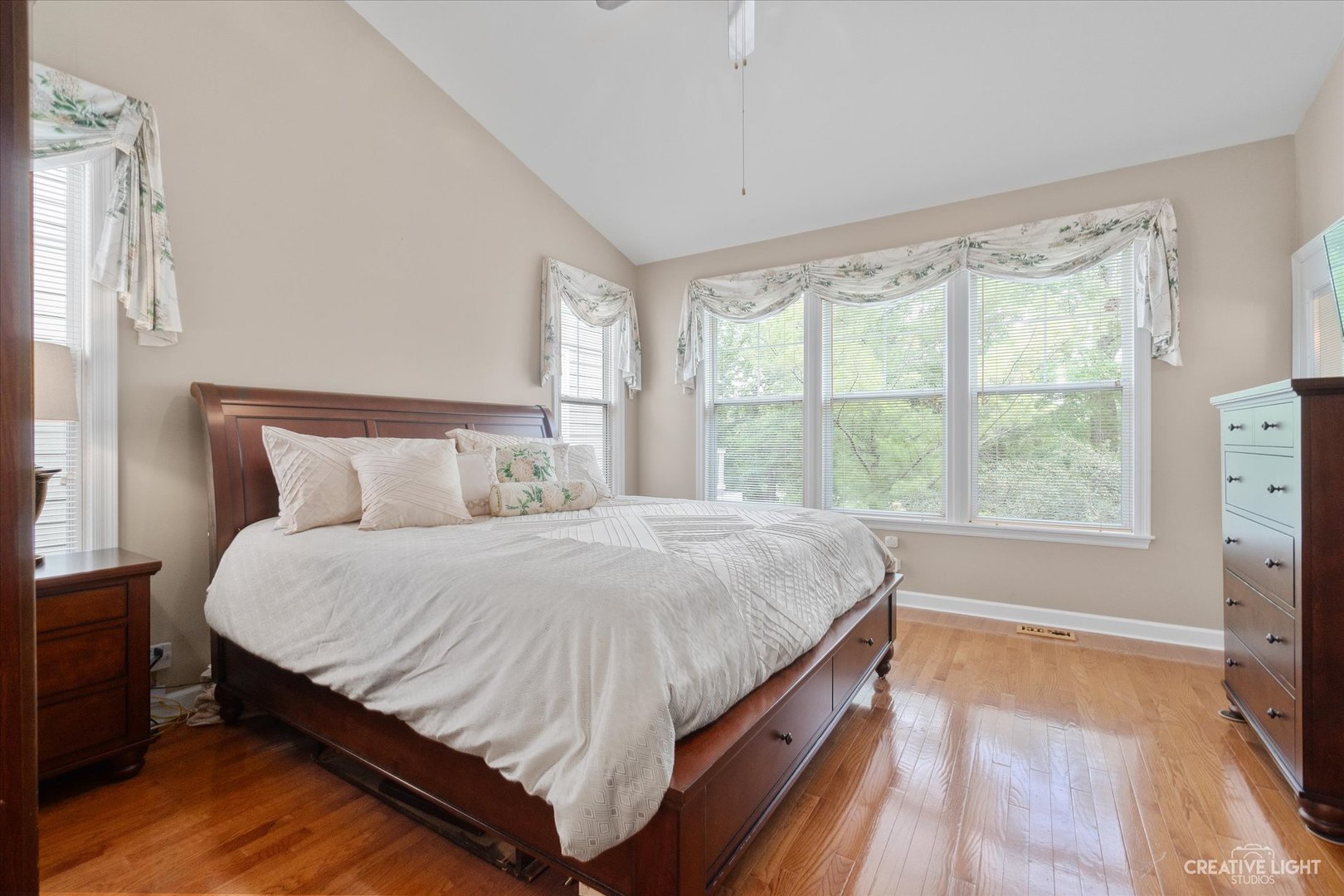 708 Viewpointe Drive St. Charles, IL 60174 - Photo 17 of 38 a large bed sitting in a bedroom next to a window