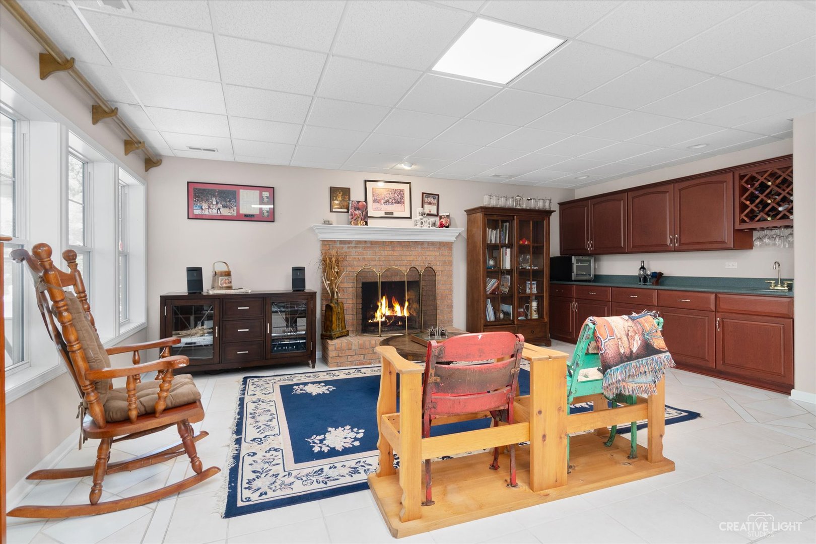 708 Viewpointe Drive St. Charles, IL 60174 - Photo 24 of 38 a living room with furniture and a fireplace