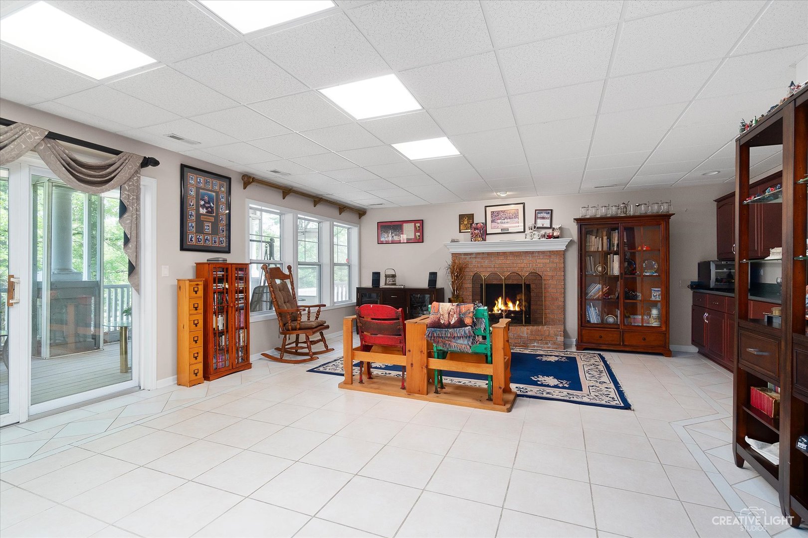 708 Viewpointe Drive St. Charles, IL 60174 - Photo 25 of 38 a view of game room with window and couch