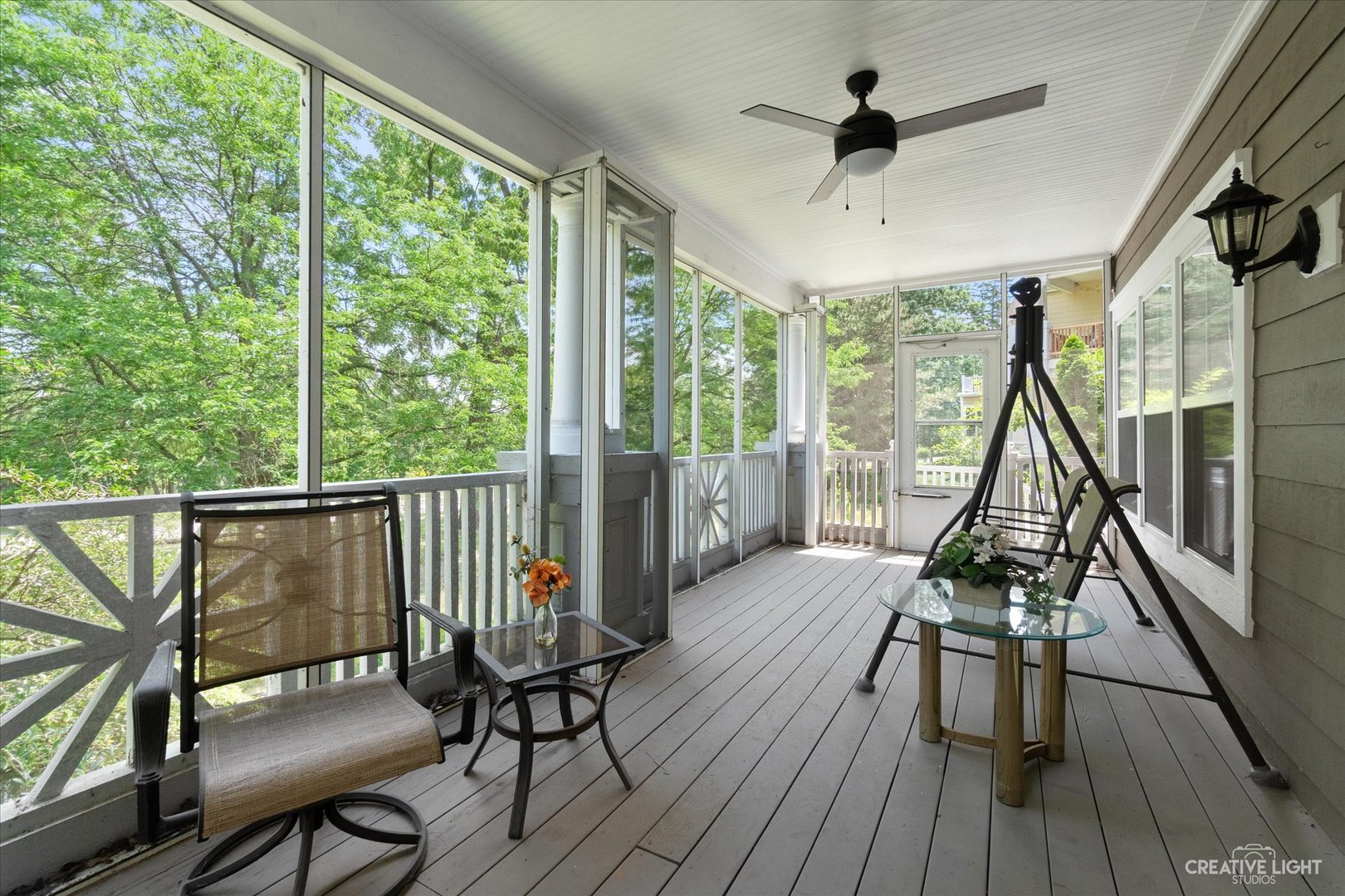 708 Viewpointe Drive St. Charles, IL 60174 - Photo 28 of 38 a view of a balcony with chairs and wooden floor