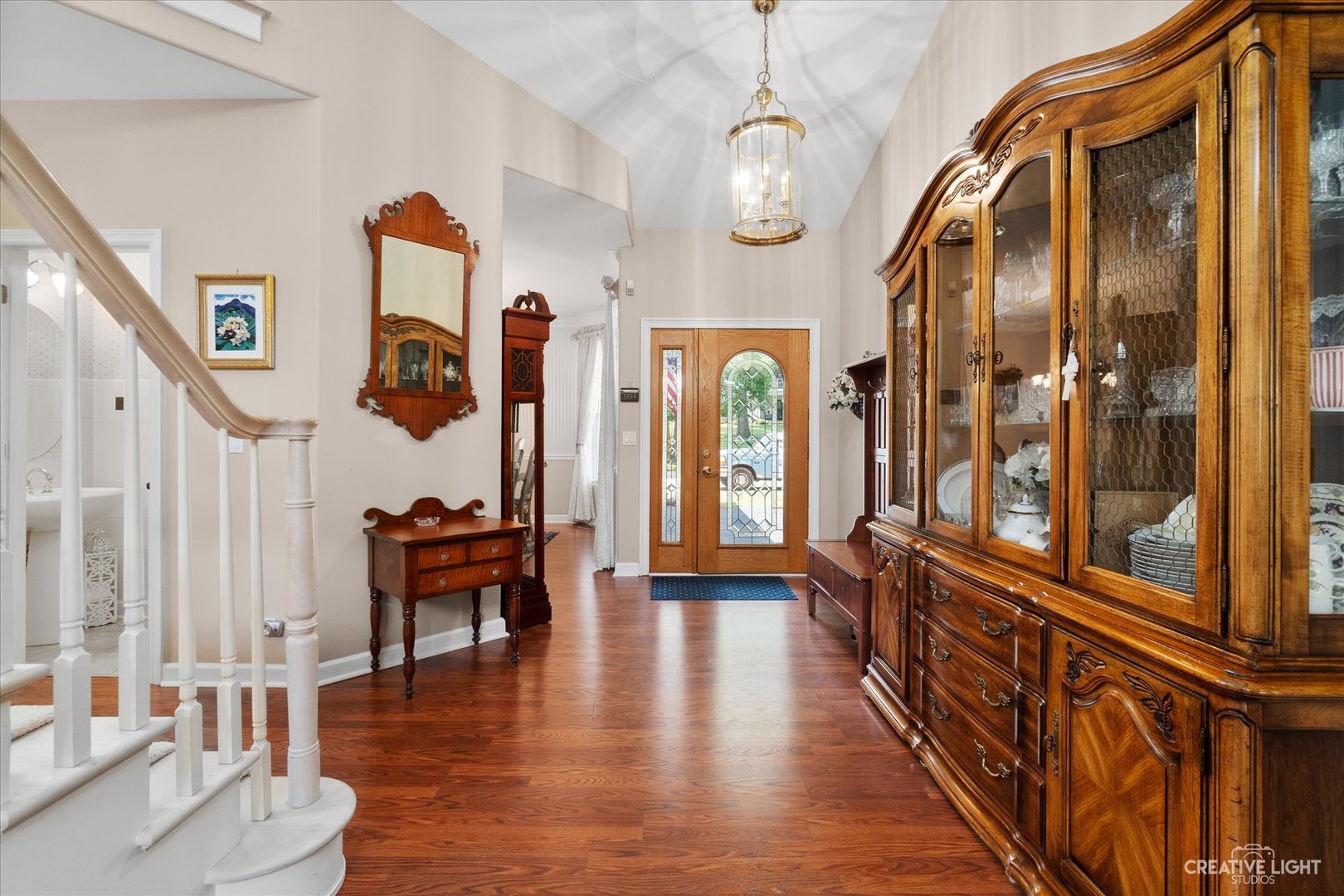 708 Viewpointe Drive St. Charles, IL 60174 - Photo 4 of 38 a view of an entryway with wooden floor and windows